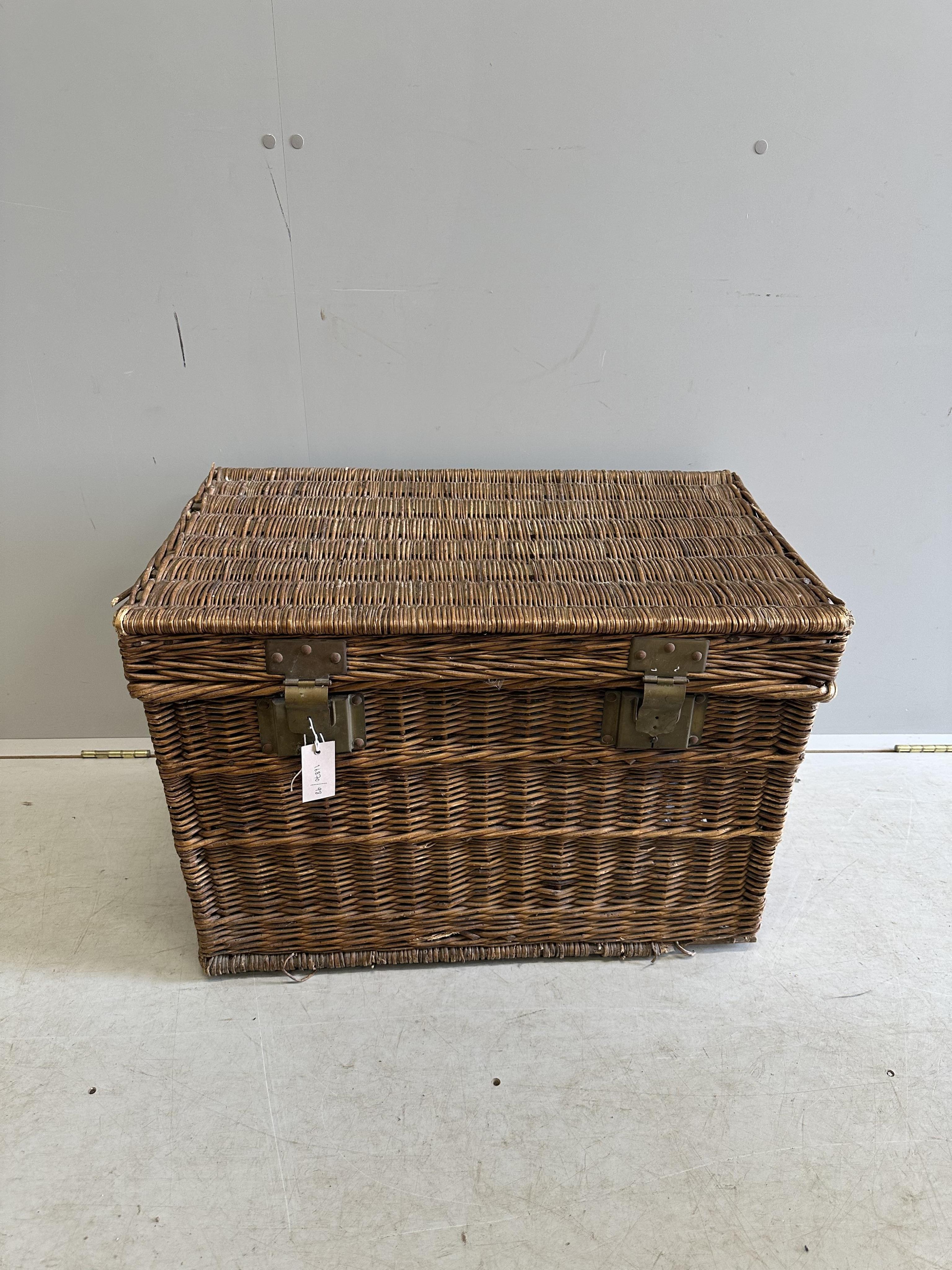 A vintage brass mounted wicker trunk, width 72cm, depth 44cm, height 50cm. Condition - fair